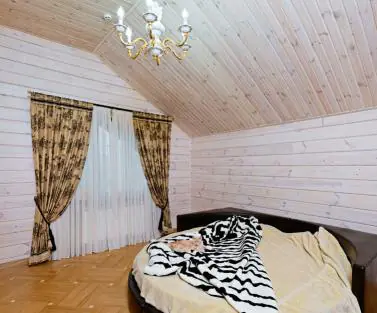 Фото гостьова кімната в будинку з клеєного бруса, побудованого за проектом №2-315 від компанії Аттика